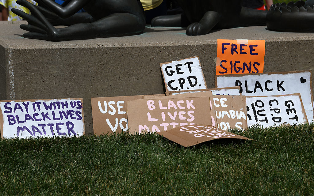 A collection of ‘free signs’ are displayed on Sunday